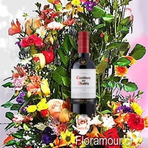 Caracola primaveral con vino y caja con 22 bombones Le Vice