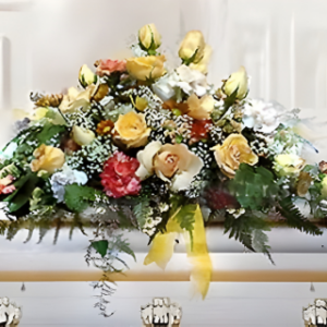 Cojín de flores de condolencias, con toques de rosas y flores mixtas. Envío a domicilio a funerales y velatorios