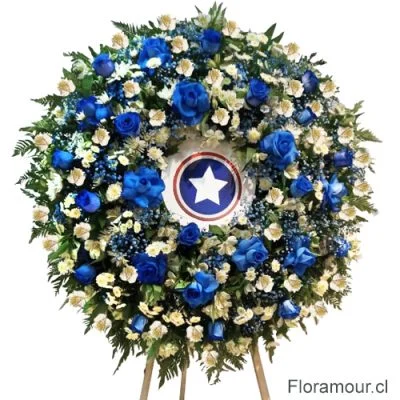 Corona ceremonial o fúnebre deluxe con rosas azules en atril