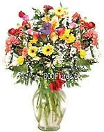 Arreglo de flores primaveral extra en florero de vidrio