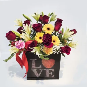 Radiant Caja de rosas y liliums