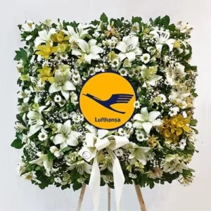 Corona de condolencias cuadrada en atril con logo